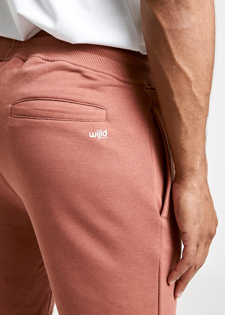 HERREN SWEAT SHORTS COPPER RED